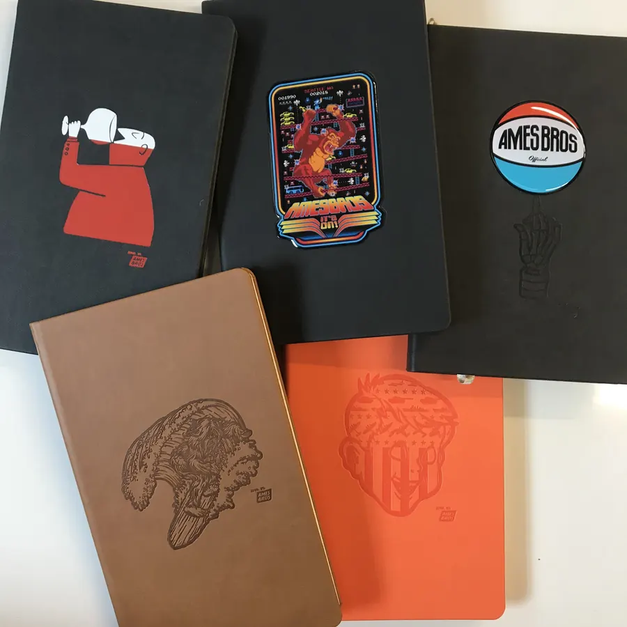Ames Bros debossed and patched leather notebooks