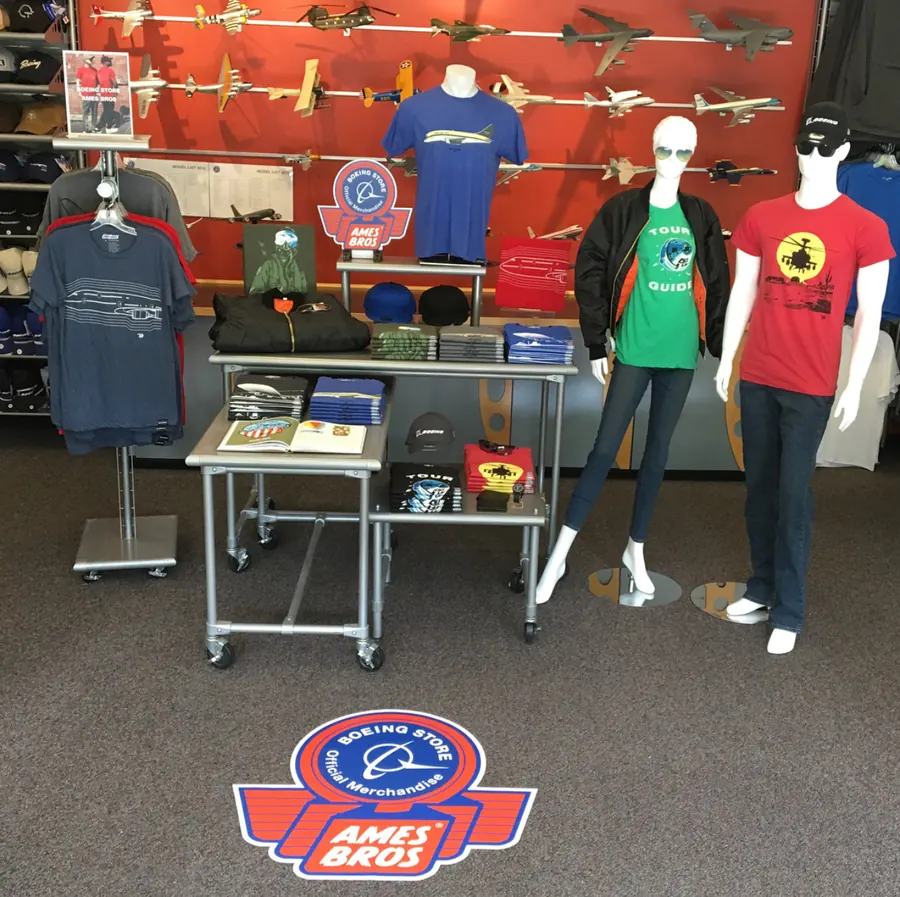Boeing Store x Ames Bros display with tees and mannequins