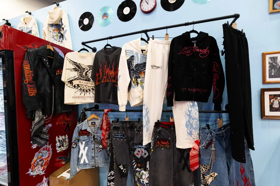 Ed Hardy x mgk jackets, denim and hoodies on the booth racks