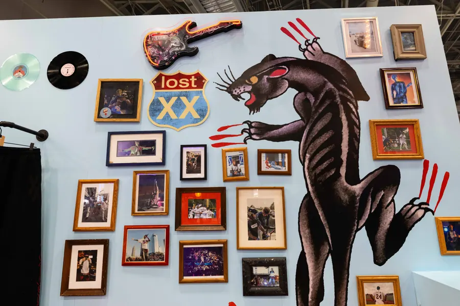 Panther wall graphic and framed photos inside the booth