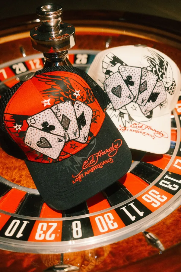 Ed Hardy x mgk caps on a roulette wheel. Photo by Sam Cahill