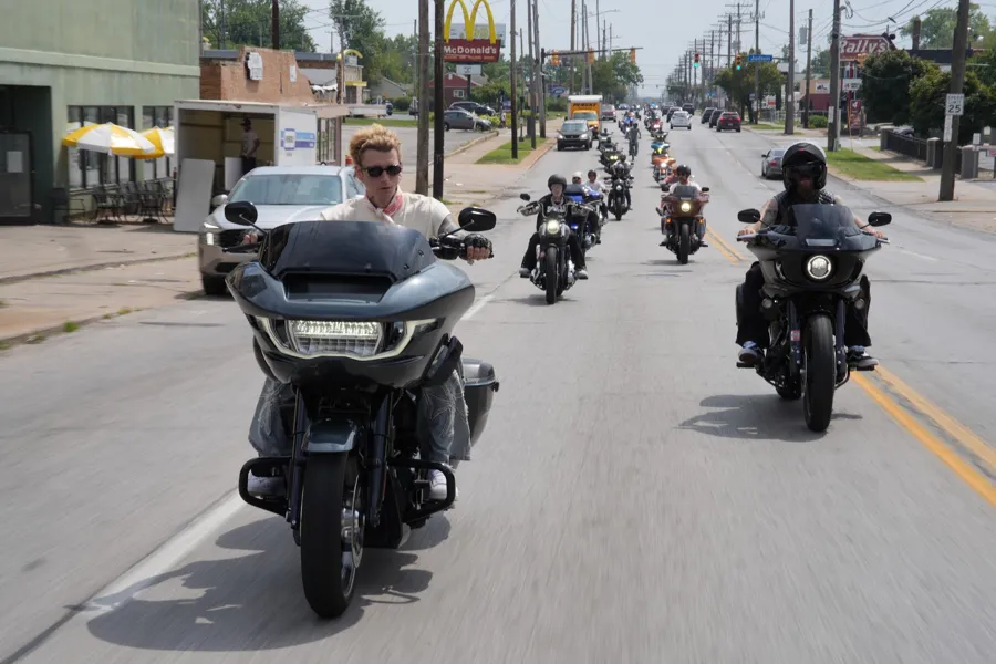 mgk leading the Harley-Davidson ride down an open road