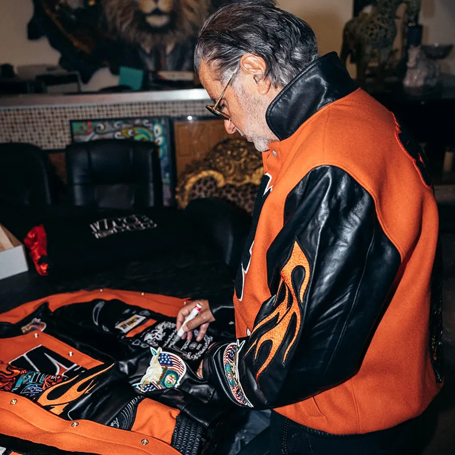 Jeff Hamilton signing a Juice WRLD jacket