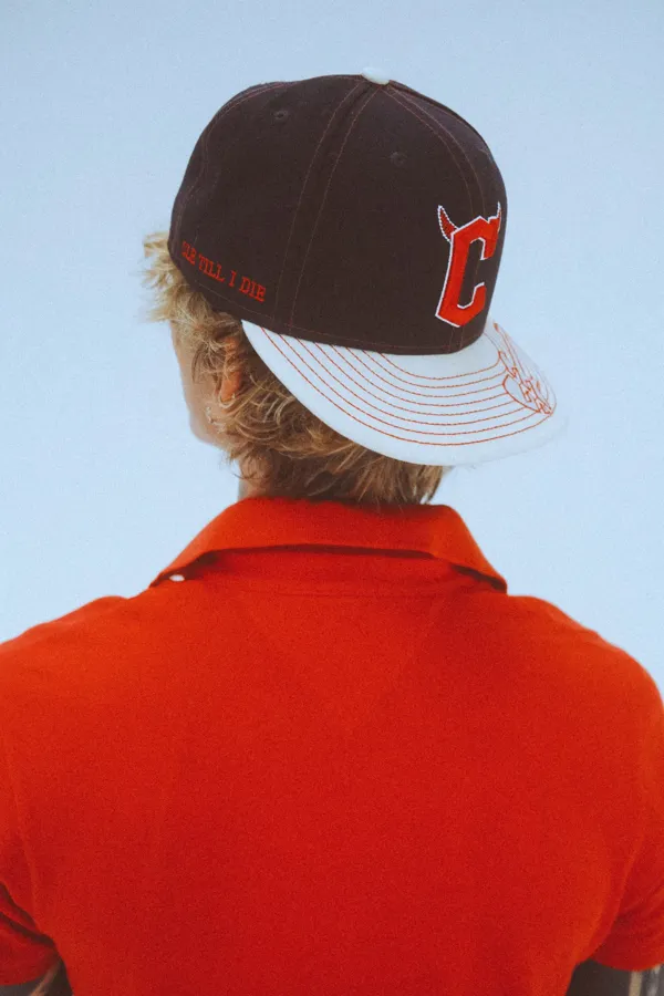 mgk x Cleveland Guardians cap from behind. Photo by Sam Cahill