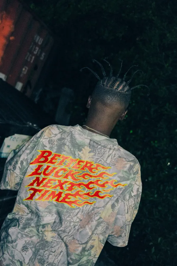 PUBG x Floor 13 camo tee, Better Luck Next Time back print. Photo by Sam Cahill