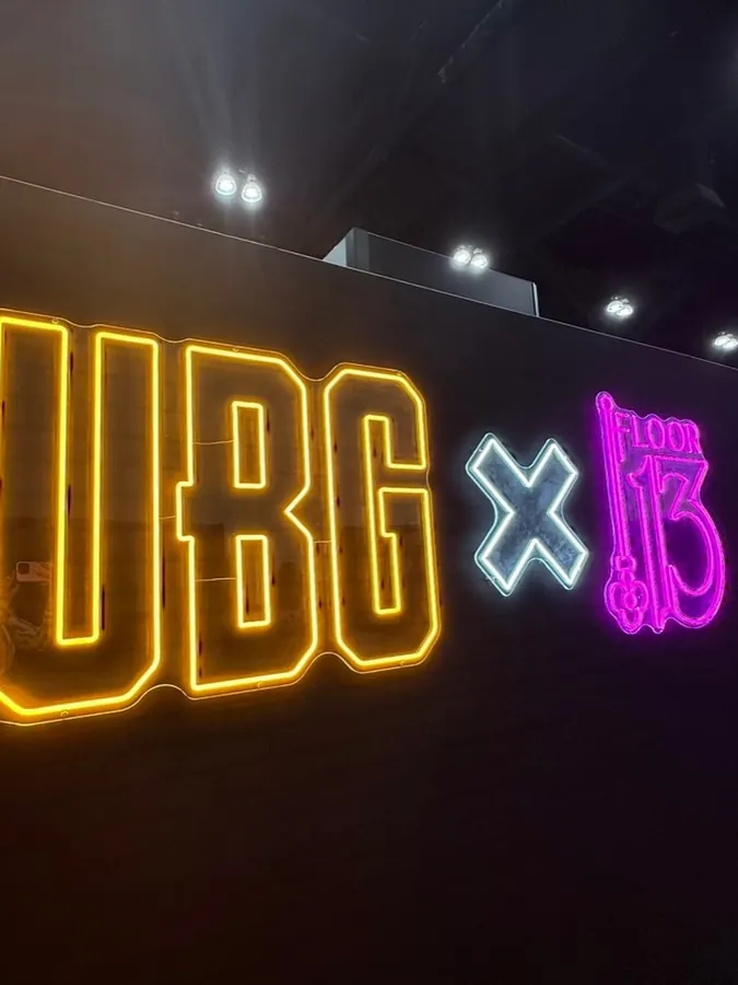 Neon PUBG x Floor 13 sign at ComplexCon